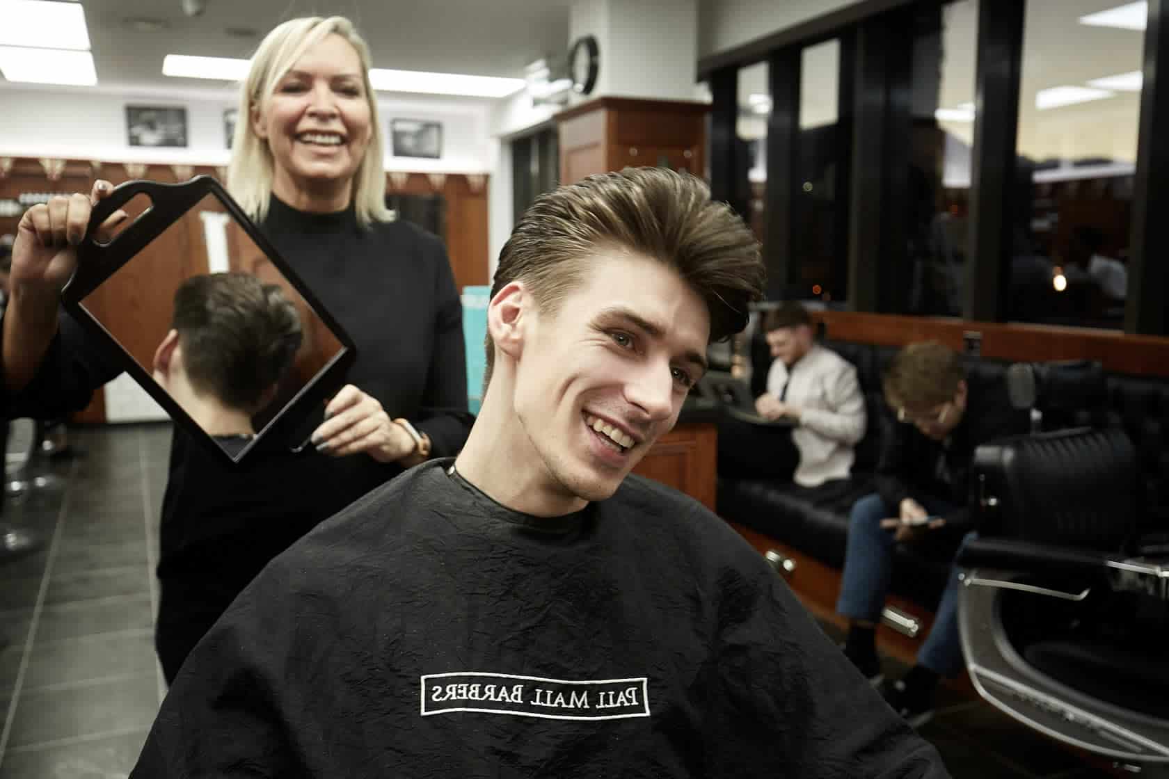 Inside image of a salon with a girl showing hairs